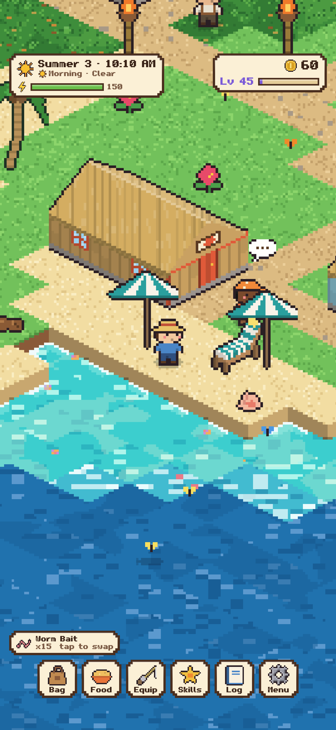 Mariposa's beach with sun loungers, umbrellas and a beach hut